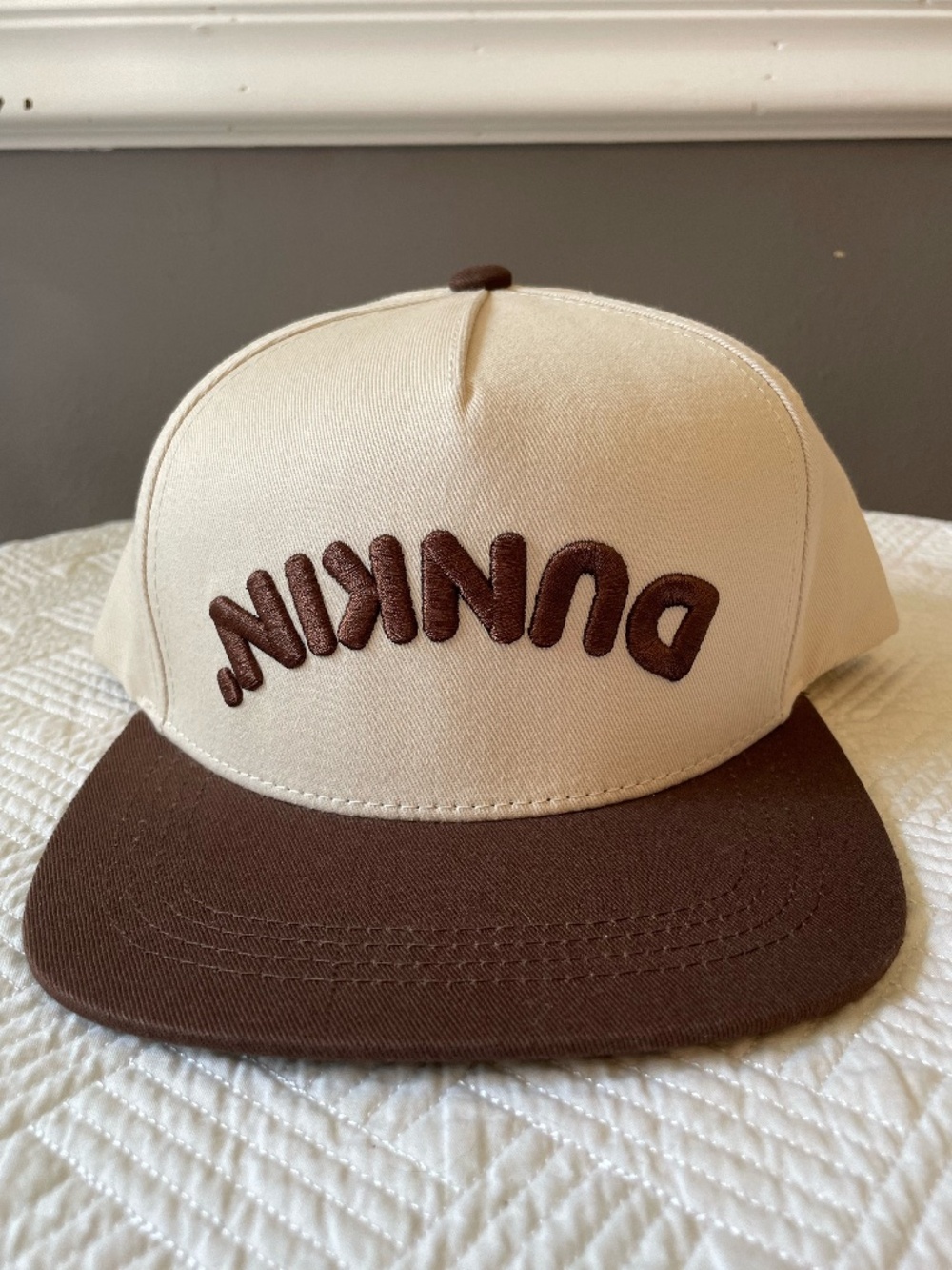 Dunkin Donuts Upside Down Logo Snapback Hat in cream and brown